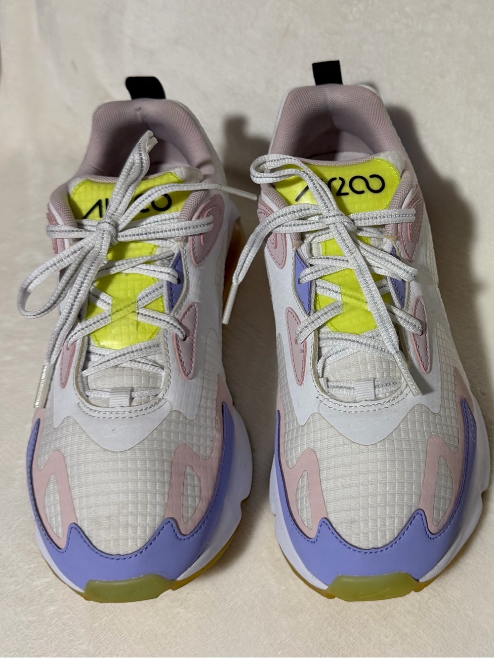 Nike White Athletic Sneakers with Lavender, Pastel Pink and Neon Yellow Accents